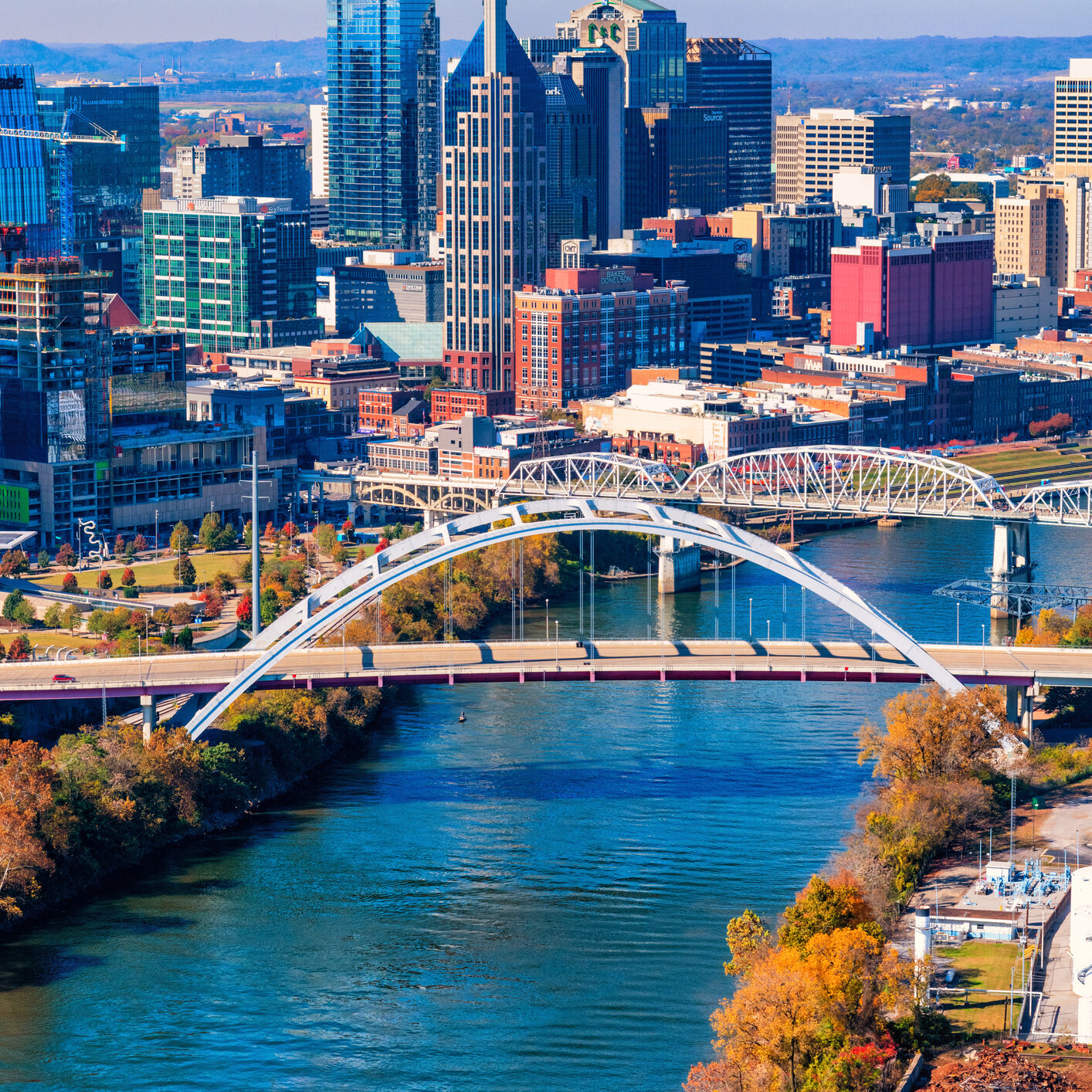 Aerial view of the skyline of beautiful Nashville, Tennessee, known as "Music City" along the banks of the Cumberland River.